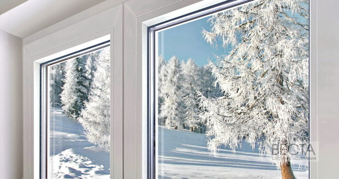 Пластиковое окно на фоне зимнего пейзажа